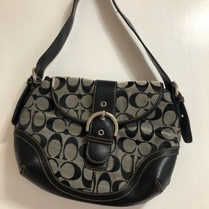 Small black and grey coach purse
